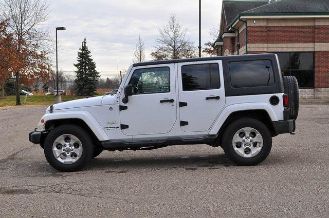 used 2015 Jeep Wrangler Unlimited car, priced at $19,302