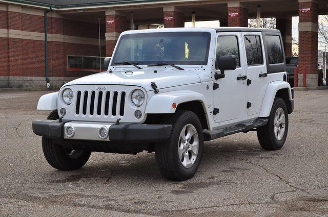 used 2015 Jeep Wrangler Unlimited car, priced at $19,302