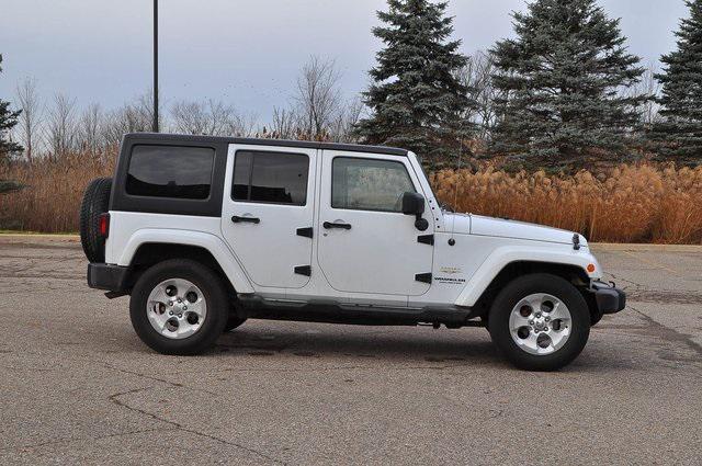 used 2015 Jeep Wrangler Unlimited car, priced at $19,302