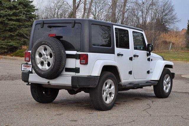 used 2015 Jeep Wrangler Unlimited car, priced at $19,302