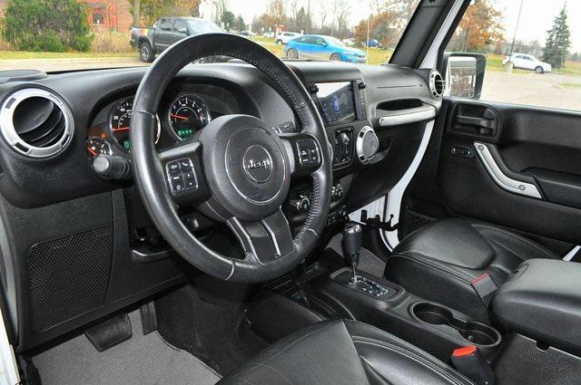 used 2015 Jeep Wrangler Unlimited car, priced at $19,302