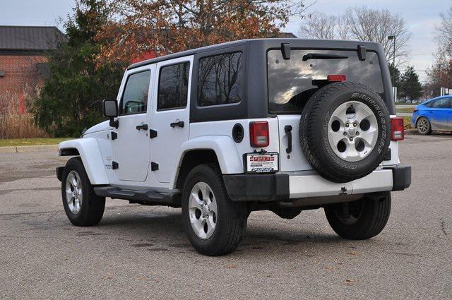 used 2015 Jeep Wrangler Unlimited car, priced at $19,302