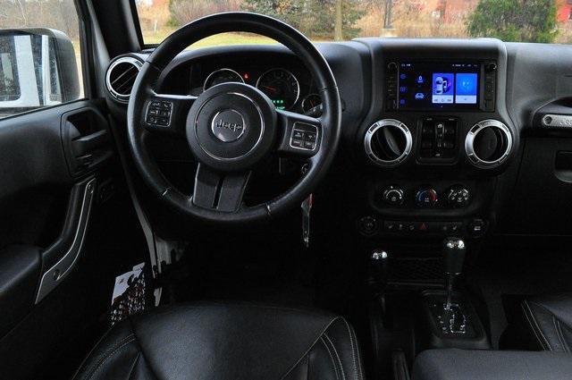 used 2015 Jeep Wrangler Unlimited car, priced at $19,302