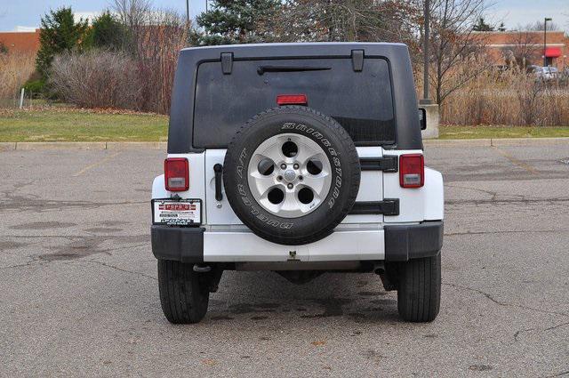 used 2015 Jeep Wrangler Unlimited car, priced at $19,302