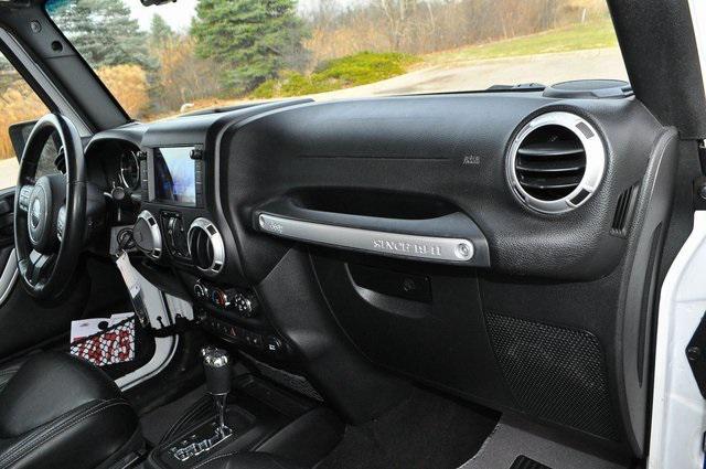 used 2015 Jeep Wrangler Unlimited car, priced at $19,302