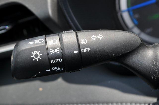 used 2021 Toyota Highlander Hybrid car, priced at $32,500