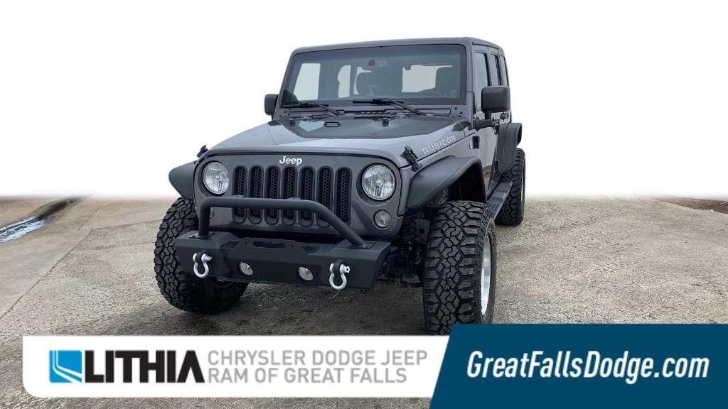 used 2014 Jeep Wrangler Unlimited car, priced at $23,998