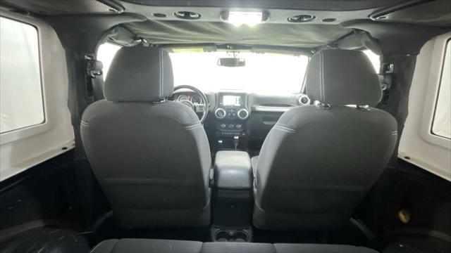 used 2015 Jeep Wrangler car, priced at $18,500