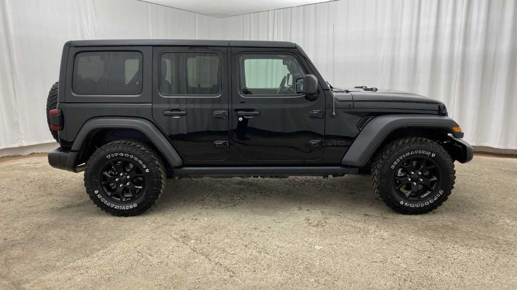 used 2021 Jeep Wrangler Unlimited car, priced at $31,700