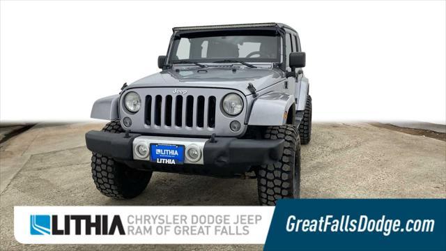 used 2014 Jeep Wrangler Unlimited car, priced at $18,199