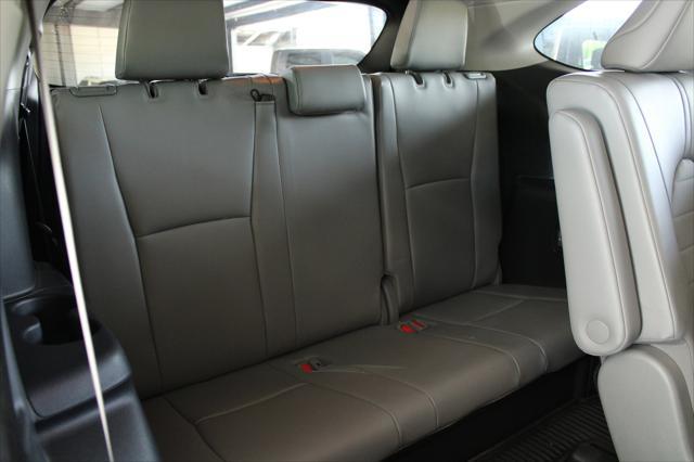 used 2022 Toyota Highlander Hybrid car, priced at $29,999