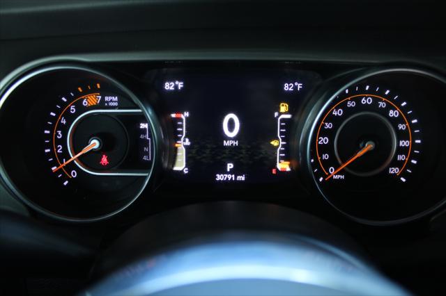 used 2023 Jeep Wrangler car, priced at $33,674