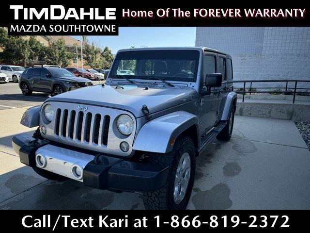 used 2014 Jeep Wrangler Unlimited car, priced at $13,877