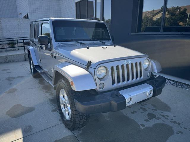 used 2014 Jeep Wrangler Unlimited car, priced at $13,877