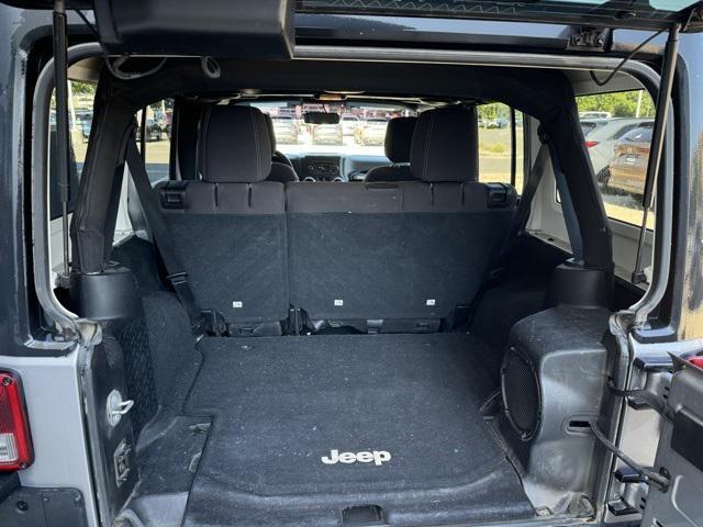 used 2014 Jeep Wrangler Unlimited car, priced at $13,877