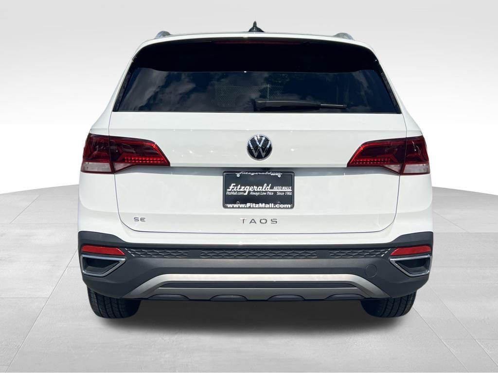 used 2024 Volkswagen Taos car, priced at $19,995