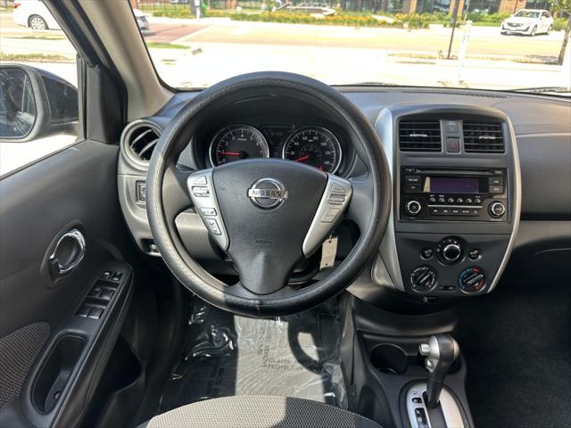 used 2015 Nissan Versa car, priced at $5,400