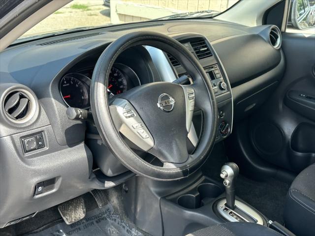 used 2015 Nissan Versa car, priced at $5,400