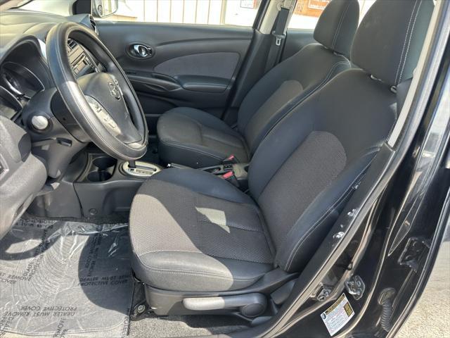 used 2015 Nissan Versa car, priced at $5,400