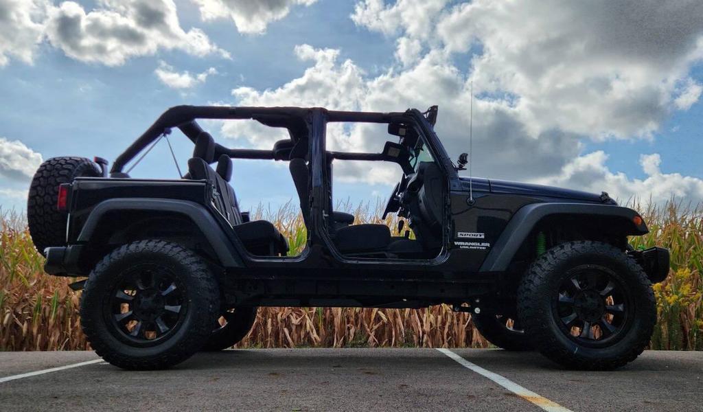 used 2013 Jeep Wrangler Unlimited car, priced at $20,980