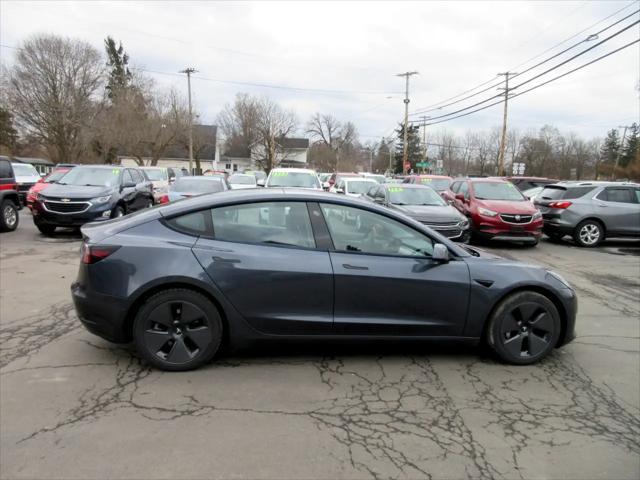 used 2022 Tesla Model 3 car, priced at $17,995