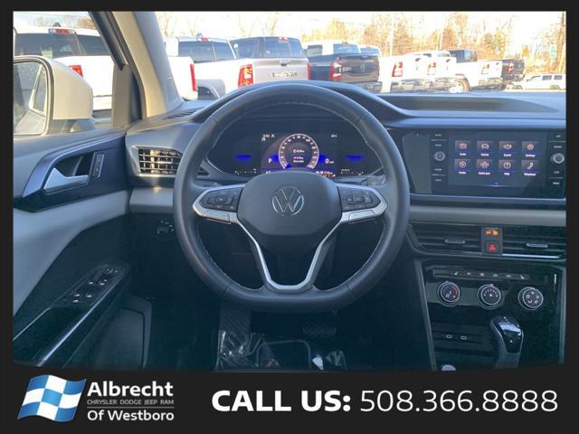 used 2023 Volkswagen Taos car, priced at $22,999