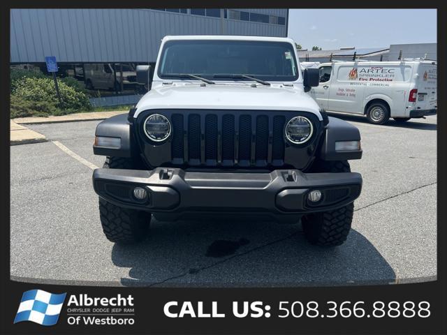 used 2021 Jeep Wrangler car, priced at $34,857