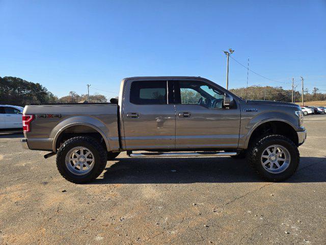 used 2018 Ford F-150 car, priced at $25,233