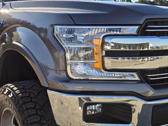 used 2018 Ford F-150 car, priced at $25,233