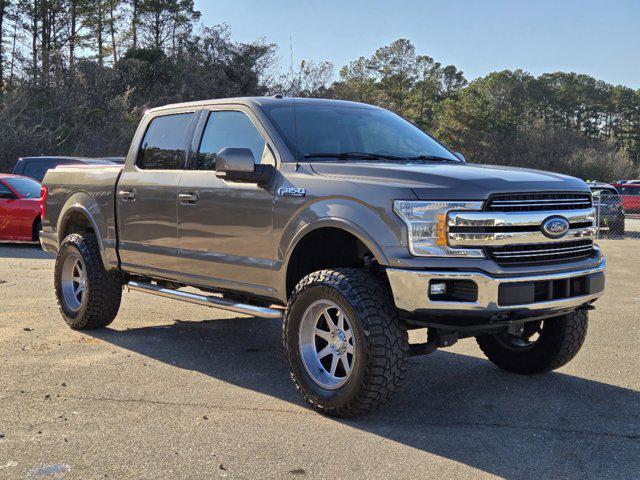 used 2018 Ford F-150 car, priced at $25,233