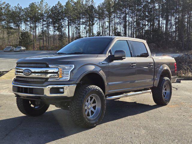 used 2018 Ford F-150 car, priced at $25,233