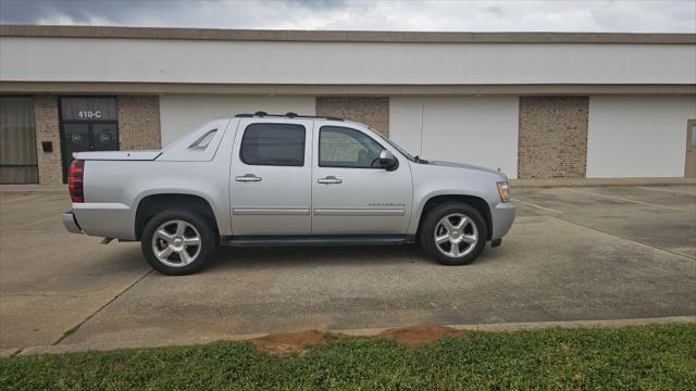 used 2011 Chevrolet Avalanche car, priced at $13,500