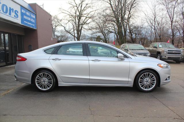 used 2015 Ford Fusion car, priced at $6,495