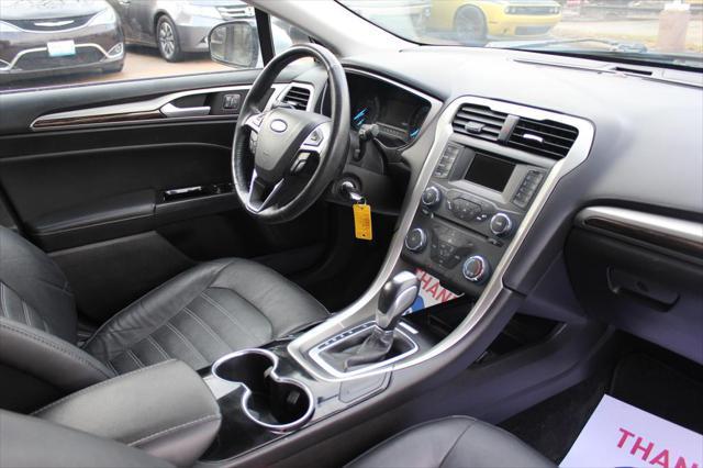 used 2015 Ford Fusion car, priced at $6,495