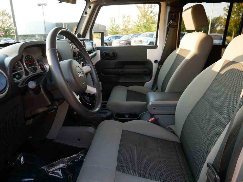 used 2010 Jeep Wrangler Unlimited car, priced at $7,999