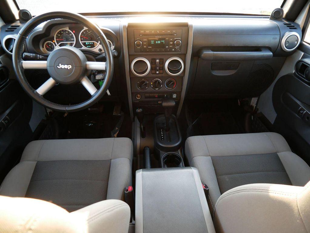 used 2010 Jeep Wrangler Unlimited car, priced at $7,999