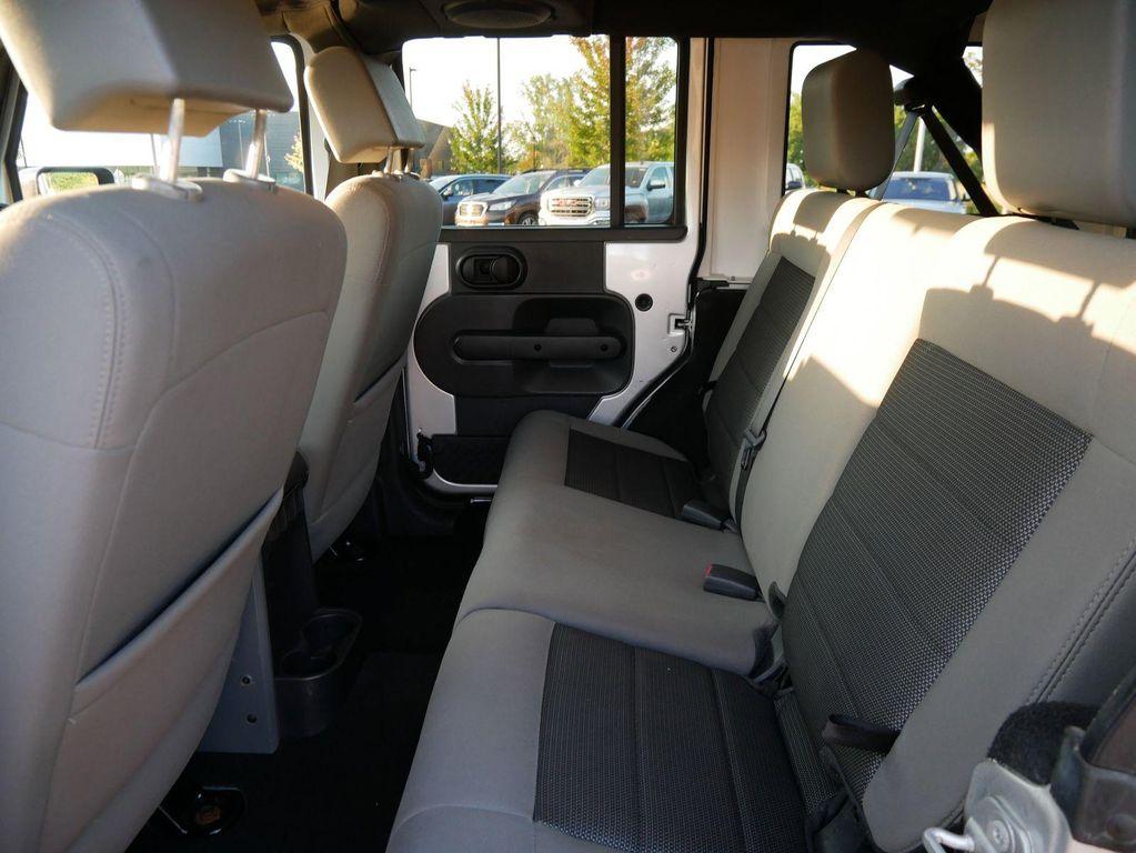 used 2010 Jeep Wrangler Unlimited car, priced at $7,999