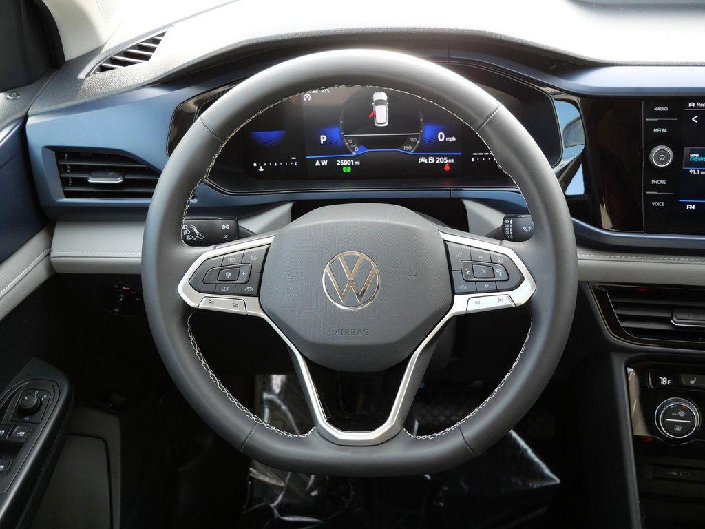 used 2024 Volkswagen Taos car, priced at $24,567