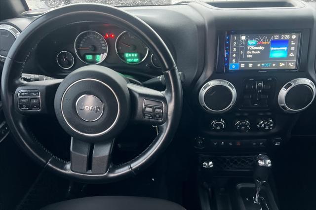 used 2015 Jeep Wrangler Unlimited car, priced at $21,992