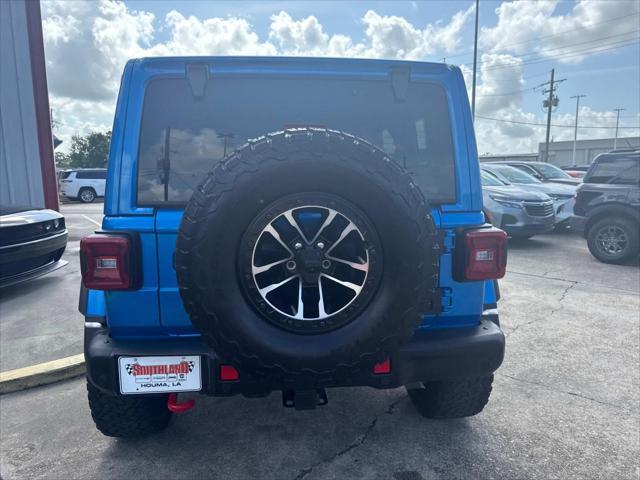 used 2024 Jeep Wrangler car, priced at $59,997