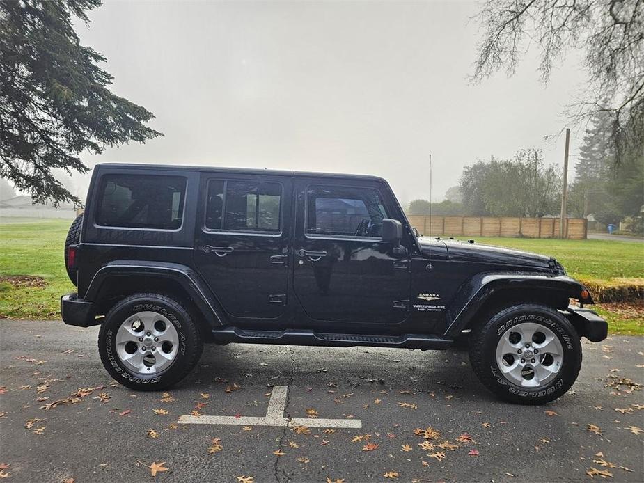 used 2015 Jeep Wrangler Unlimited car, priced at $19,881