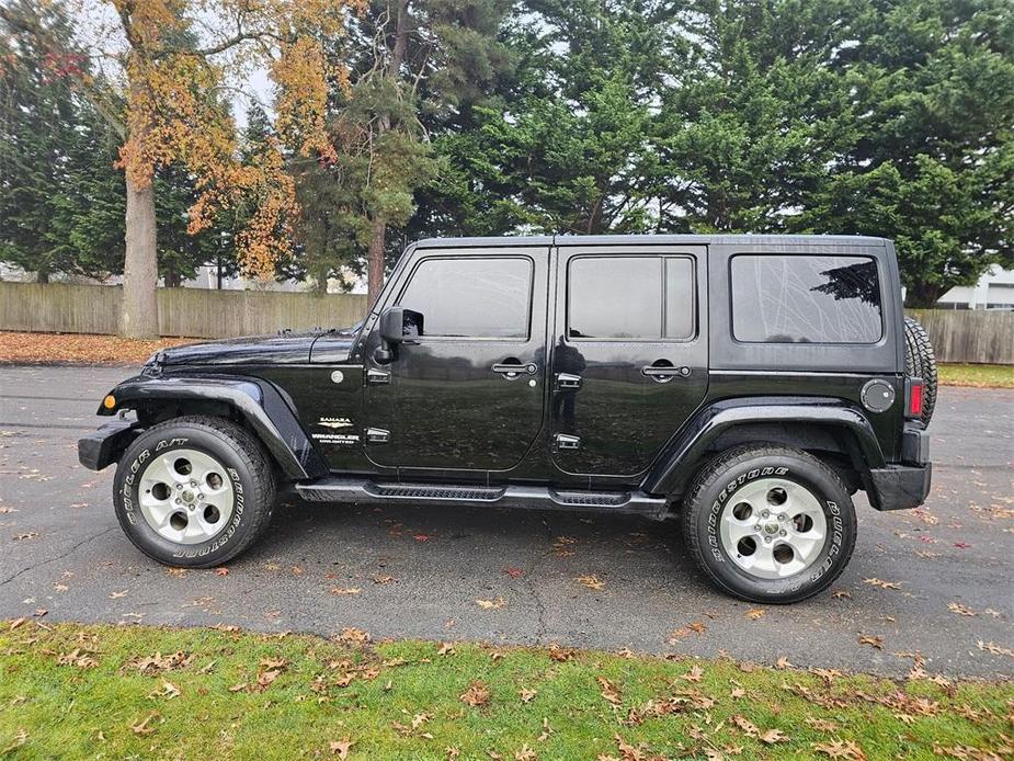 used 2015 Jeep Wrangler Unlimited car, priced at $19,881