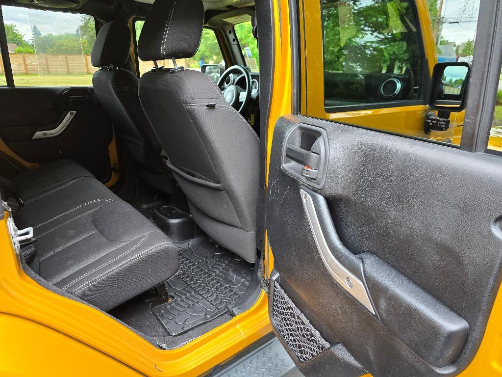 used 2014 Jeep Wrangler Unlimited car, priced at $19,881