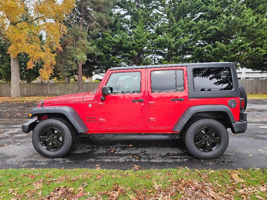 used 2015 Jeep Wrangler Unlimited car, priced at $22,881