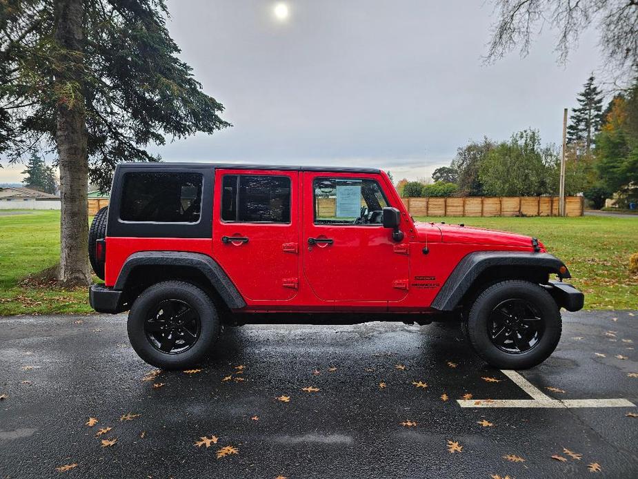 used 2015 Jeep Wrangler Unlimited car, priced at $22,881