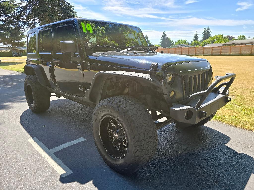 used 2014 Jeep Wrangler Unlimited car, priced at $20,881