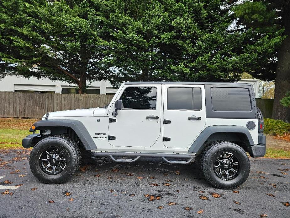 used 2016 Jeep Wrangler Unlimited car, priced at $22,881