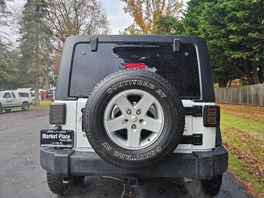 used 2016 Jeep Wrangler Unlimited car, priced at $22,881