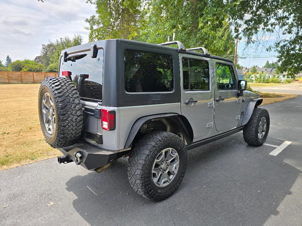 used 2016 Jeep Wrangler Unlimited car, priced at $16,881