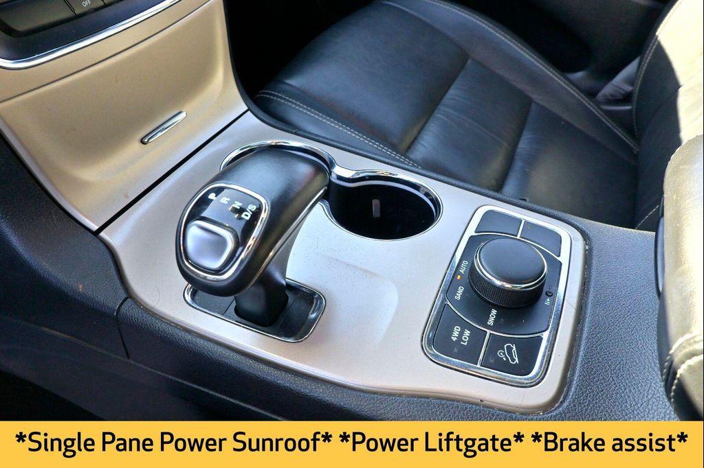 used 2014 Jeep Grand Cherokee car, priced at $12,558